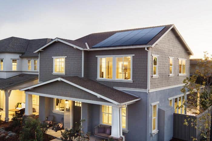 Castaways Energy Residential Solar array on a two story house rooftop.