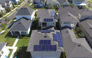 Castaways Energy Residential Solar arrays on a couple of house rooftops.