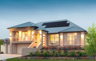 Modern house with solar panels on the roof at dusk