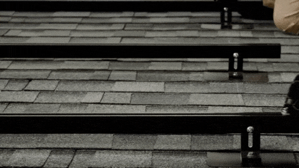 Qcells solar panel installation process by Castaways Energy, showcasing expert mounting on shingle roof for reliable solar solutions.