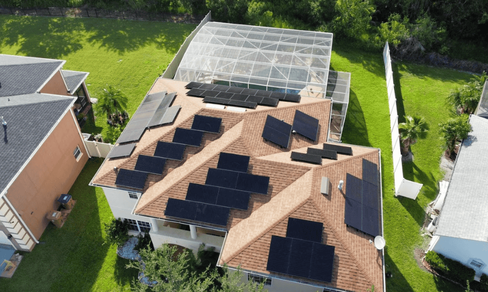 Aerial view of residential home with solar panels installed by Castaways Energy, showcasing effective solar energy solutions.