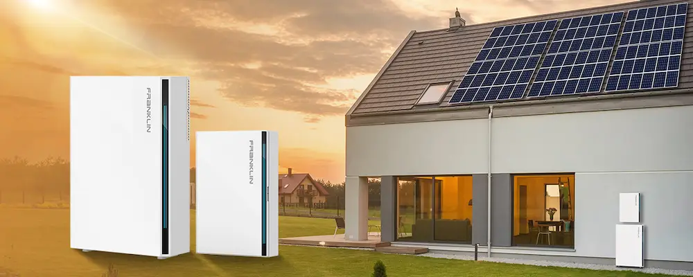 FranklinWH energy storage systems installed in a modern home with solar panels at sunset, provided by Castaways Energy.