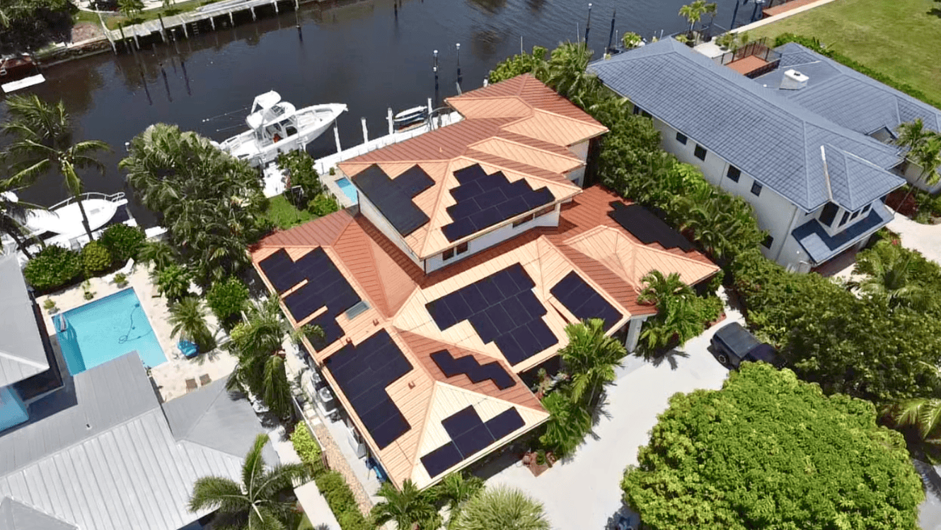 Jeffrey & Joan Hoffberger's standing seam roof with Aptos solar panels by Castaways Energy