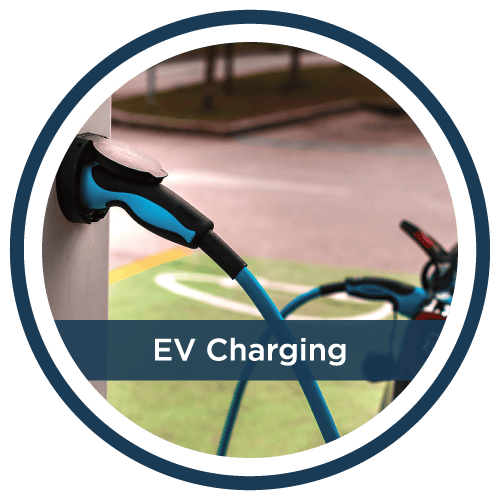 EV charging station with a connected electric vehicle, showcasing sustainable energy solutions from Castaways Energy.