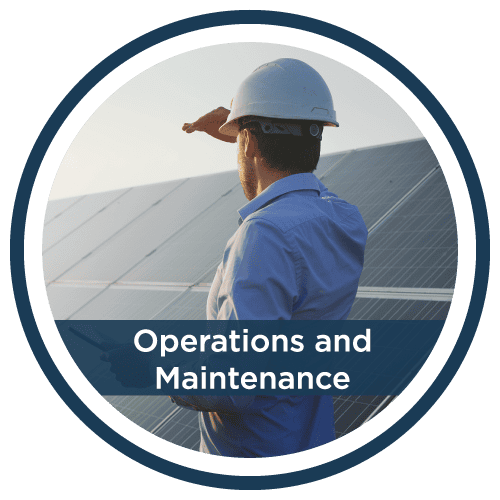 Operations & Maintenance. A solar installer is looking at a solar array.