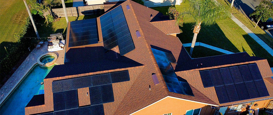 Aerial view of a solar array on a large home.