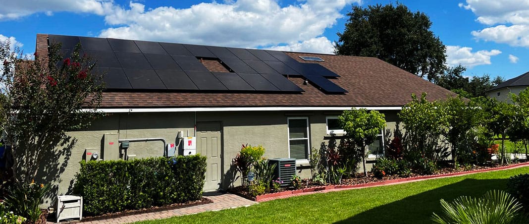 Castaways Roofing and solar installation on a Central Florida home with black rooftop solar panels and asphalt shingles. Castaways Roofing and solar installation on a Central Florida home with black rooftop solar panels and asphalt shingles.